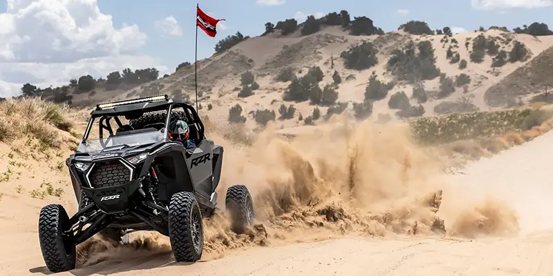 UTV jumping a sand dune in Winchester Bay, Oregon
